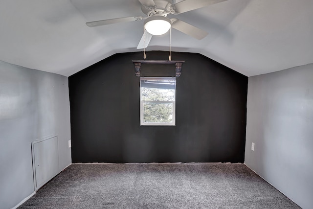 bonus room featuring lofted ceiling, a ceiling fan, and carpet flooring