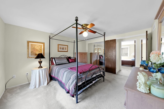 15690 Grainger Dr, Clinton Township, MI 48038 - bedroom with light carpet, ceiling fan, and baseboards