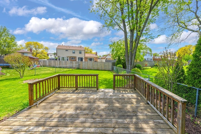 15690 Grainger Dr, Clinton Township, MI 48038 - wooden deck featuring a playground