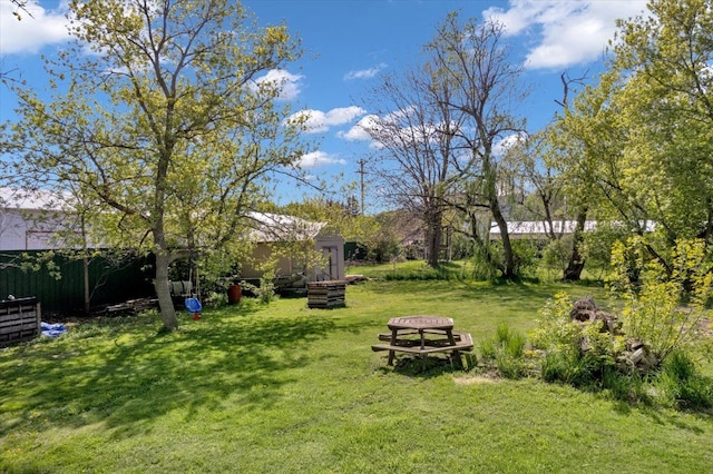 view of yard featuring a fire pit