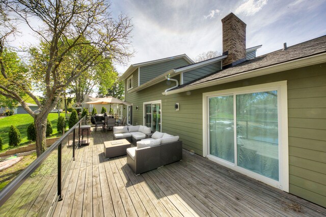 wooden deck with outdoor lounge area