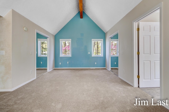carpeted spare room with baseboards