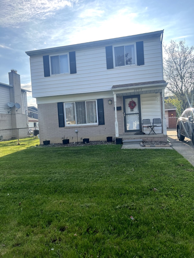 view of front facade featuring brick siding
