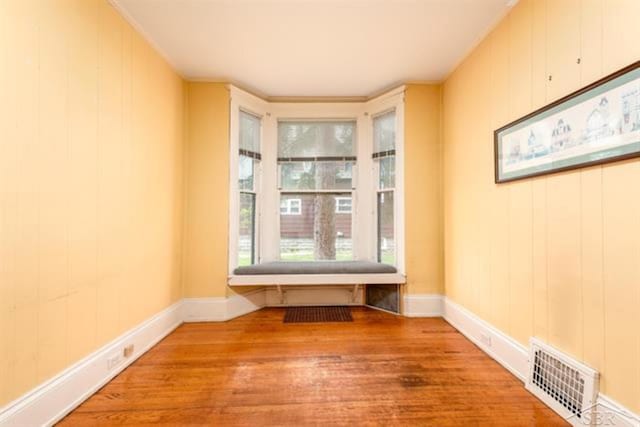 2152 6th St, Bay City, MI 48706 - spare room with hardwood / wood-style flooring and baseboards