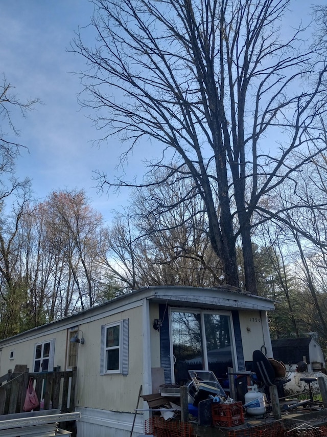 1677 S Sumac Ave, White Cloud, MI 49349 - view of property exterior featuring a wooden deck