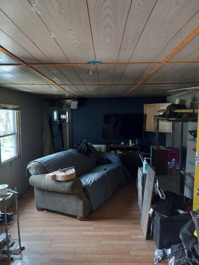 1677 S Sumac Ave, White Cloud, MI 49349 - living area featuring light wood-style flooring and wooden ceiling