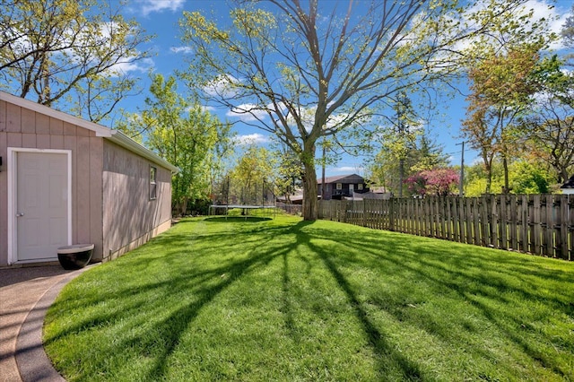 view of yard featuring a trampoline