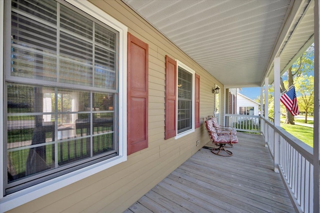 wooden deck featuring a porch