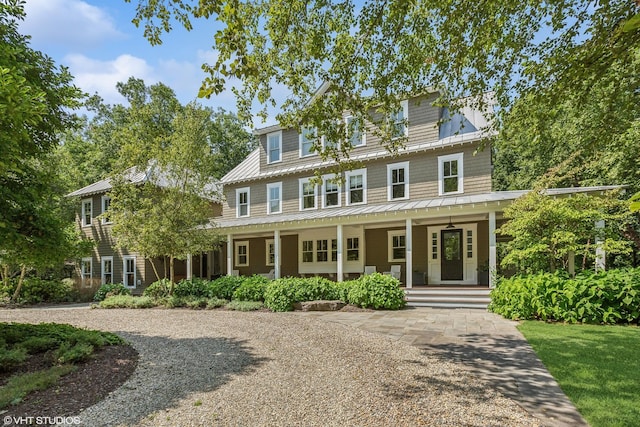 view of front of house with a porch and a standing seam roof