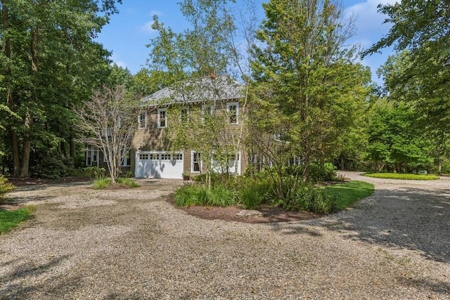 view of front facade featuring an attached garage and driveway