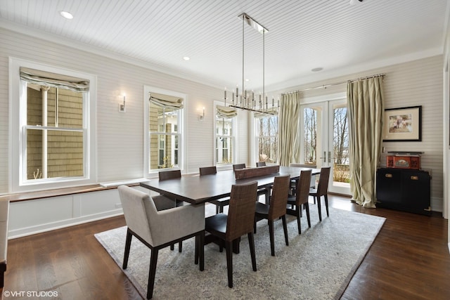 dining space with ornamental molding, dark wood-type flooring, and recessed lighting