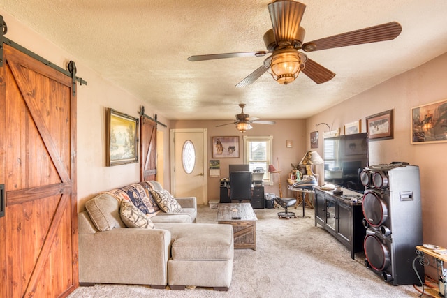 321 N Norman St, Barryton, MI 49305 - living room featuring a barn door, a textured ceiling, carpet flooring, a desk, and a ceiling fan