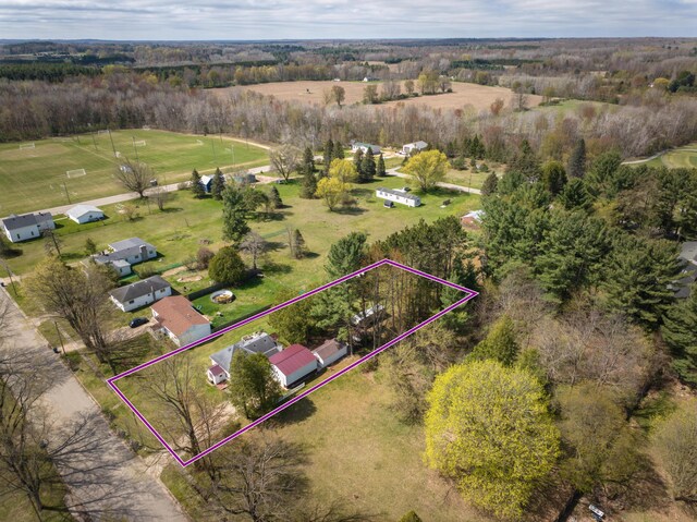 321 N Norman St, Barryton, MI 49305 - aerial view of sparsely populated area with property parcel outlined