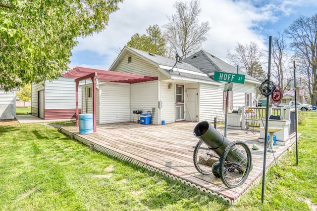 321 N Norman St, Barryton, MI 49305 - rear view of house with a wooden deck and a yard