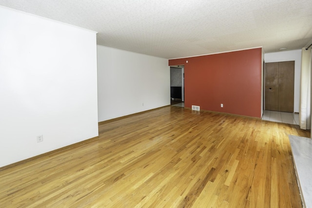 1620 Whittier Rd, Ypsilanti, MI 48197 - unfurnished room with light wood-type flooring