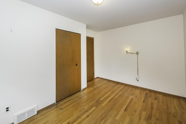 1620 Whittier Rd, Ypsilanti, MI 48197 - empty room with light wood-style flooring and baseboards