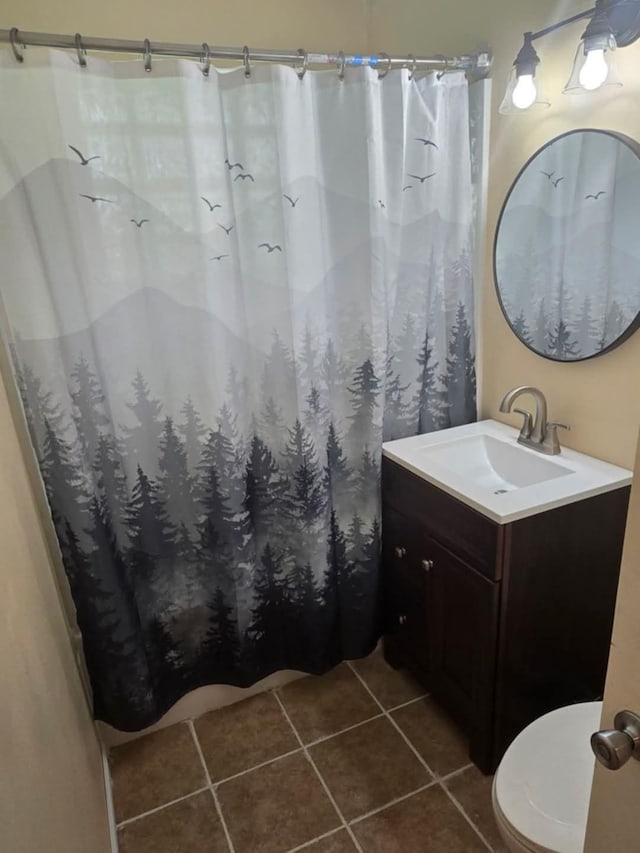 3935 Orr Dr, North Branch, MI 48461 - bathroom with tile patterned floors, vanity, toilet, and curtained shower