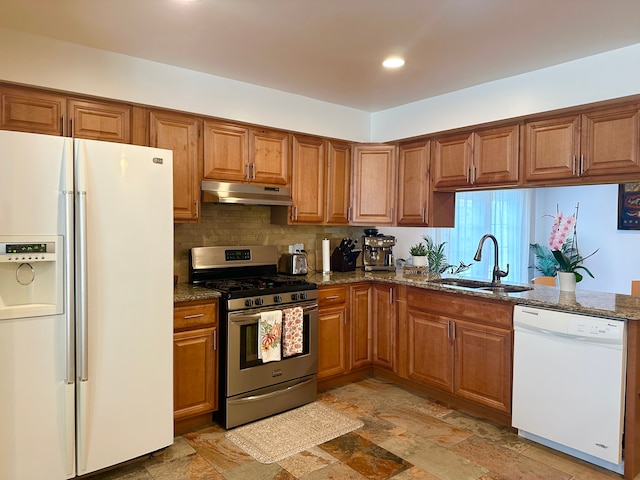 41371 Hamilton Dr, Sterling Heights, MI 48313 - kitchen with white appliances, under cabinet range hood, a sink, brown cabinets, and recessed lighting