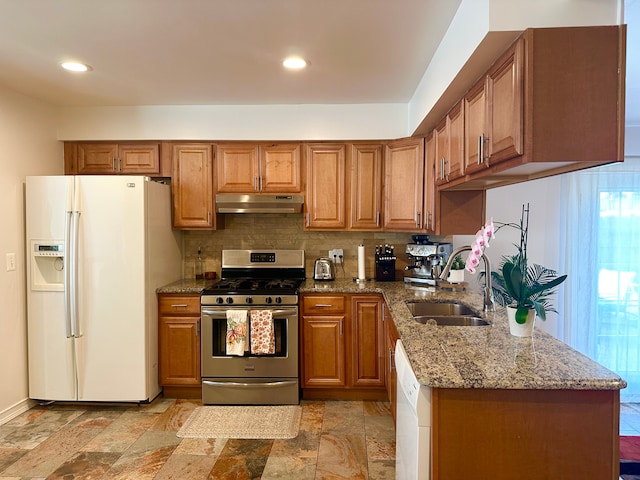 41371 Hamilton Dr, Sterling Heights, MI 48313 - kitchen featuring white appliances, a sink, under cabinet range hood, brown cabinets, and recessed lighting