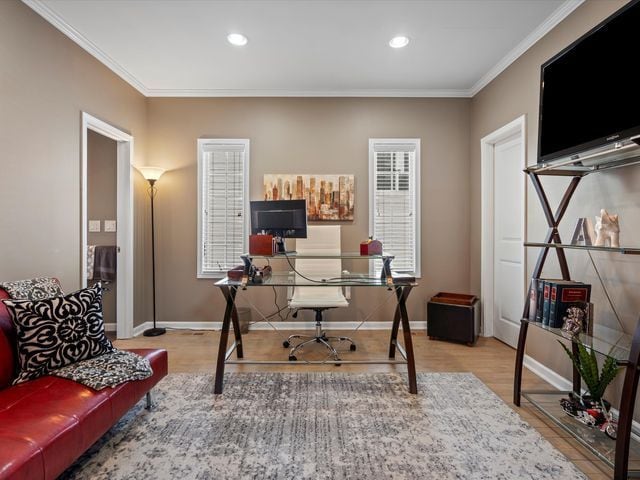 office featuring crown molding, wood finished floors, baseboards, and recessed lighting