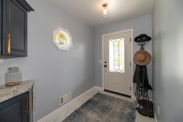 8811 Waruf Ave, Portage, MI 49002 - foyer entrance with baseboards and light marble finish floors