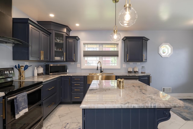 8811 Waruf Ave, Portage, MI 49002 - kitchen featuring black / electric stove, wall chimney range hood, stainless steel microwave, light marble finish floors, and a center island