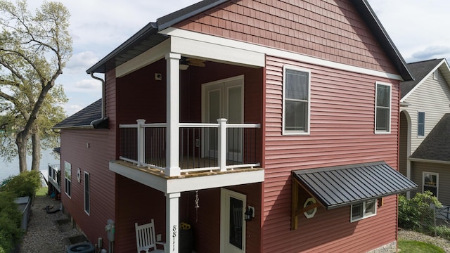 8811 Waruf Ave, Portage, MI 49002 - view of side of property with a balcony and a central AC unit