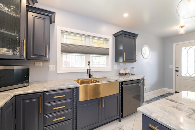8811 Waruf Ave, Portage, MI 49002 - kitchen featuring appliances with stainless steel finishes, light marble finish flooring, light stone counters, and recessed lighting