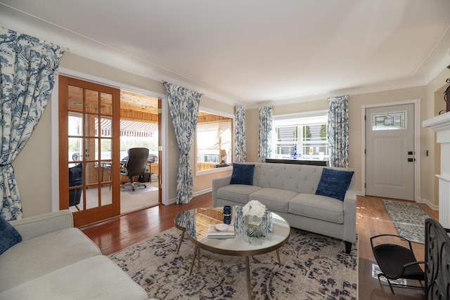 8811 Waruf Ave, Portage, MI 49002 - living room featuring wood finished floors and a desk
