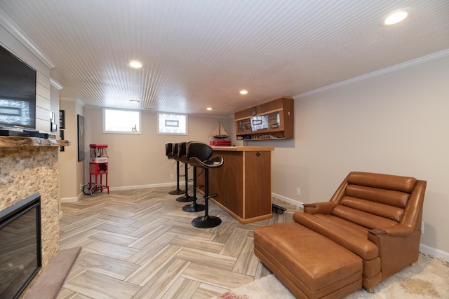 8811 Waruf Ave, Portage, MI 49002 - indoor dry bar with recessed lighting, a fireplace, and crown molding