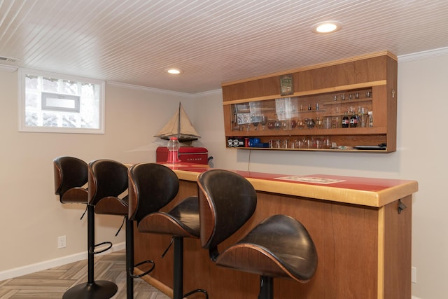 8811 Waruf Ave, Portage, MI 49002 - indoor dry bar featuring crown molding and recessed lighting