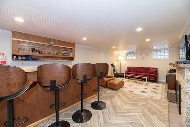 8811 Waruf Ave, Portage, MI 49002 - indoor dry bar featuring recessed lighting and ornamental molding