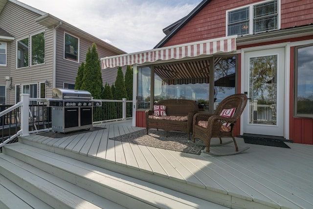 8811 Waruf Ave, Portage, MI 49002 - wooden terrace featuring a grill