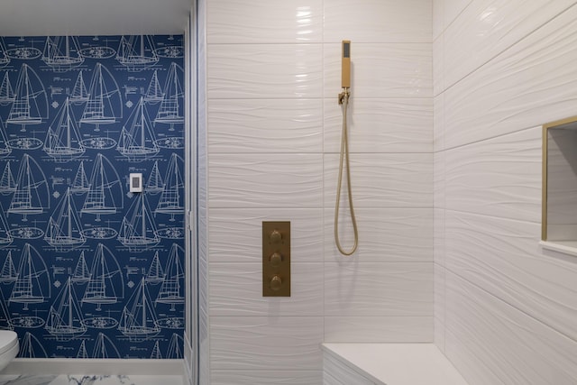 8811 Waruf Ave, Portage, MI 49002 - bathroom featuring toilet and a tile shower