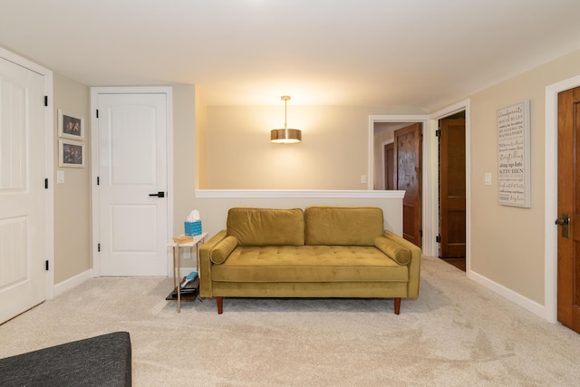 8811 Waruf Ave, Portage, MI 49002 - living area featuring carpet flooring and baseboards