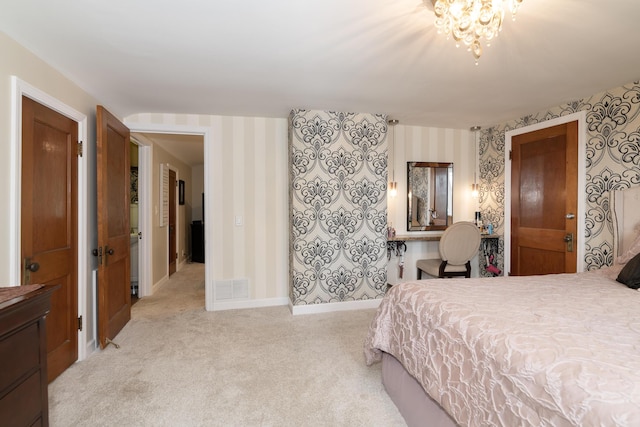 8811 Waruf Ave, Portage, MI 49002 - bedroom with wallpapered walls and light colored carpet