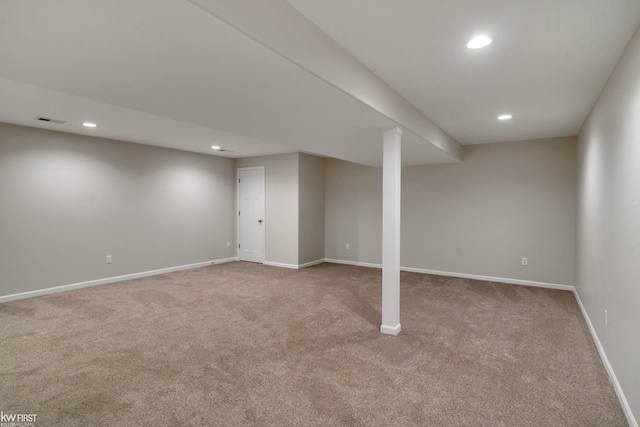 finished basement with carpet floors, recessed lighting, and baseboards