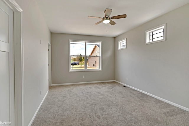 11146 Brahms Ln, Davison, MI 48423 - carpeted empty room with a ceiling fan and baseboards