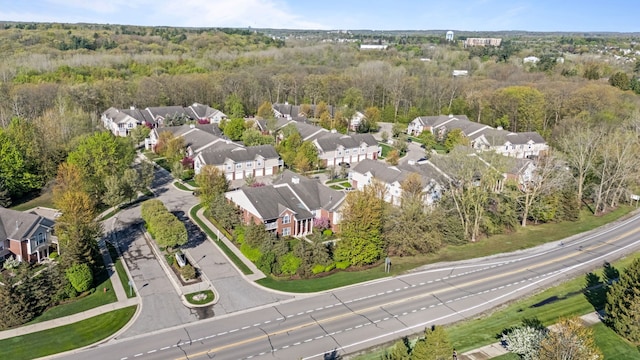 1708 Deepwood Cir, Rochester, MI 48307 - aerial view of property and surrounding area featuring nearby suburban area and a heavily wooded area