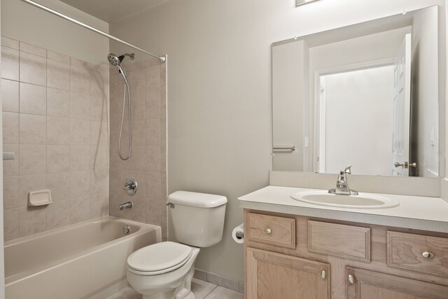 1708 Deepwood Cir, Rochester, MI 48307 - bathroom featuring toilet, vanity, tile patterned flooring, and bathtub / shower combination