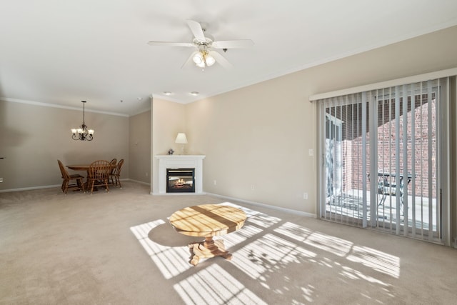 1708 Deepwood Cir, Rochester, MI 48307 - carpeted living room featuring crown molding, baseboards, a chandelier, a ceiling fan, and a glass covered fireplace