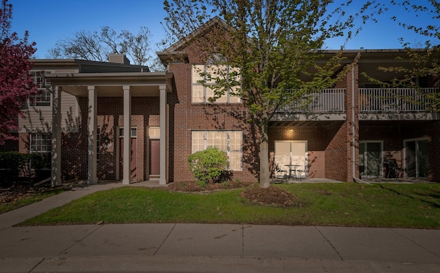 1708 Deepwood Cir, Rochester, MI 48307 - greek revival inspired property with a front lawn, brick siding, and a chimney