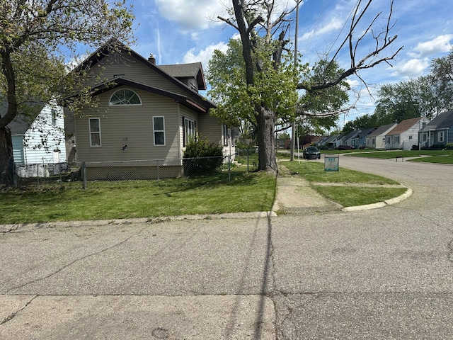 view of side of property with a chimney