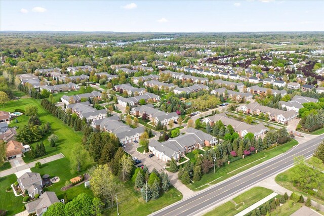 aerial view of property's location with nearby suburban area