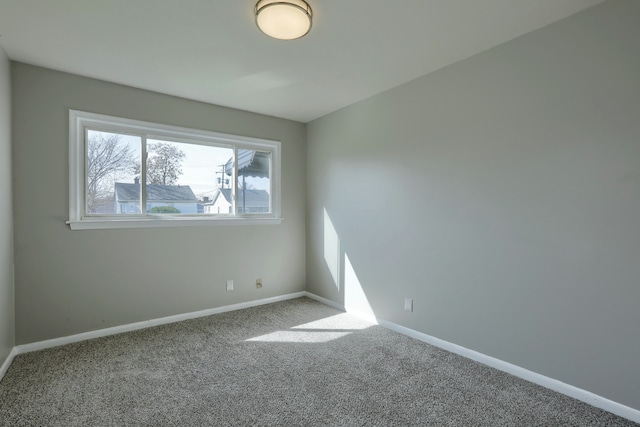 11067 Paige Ave, Warren, MI 48089 - empty room with baseboards and carpet floors