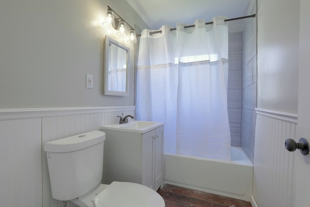 11067 Paige Ave, Warren, MI 48089 - bathroom with toilet, wainscoting, shower / tub combo with curtain, and vanity