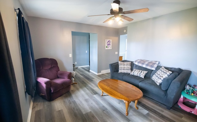1291 103rd Ave, Plainwell, MI 49080 - living room featuring wood finished floors, ceiling fan, and baseboards