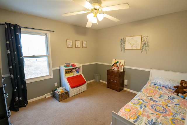1291 103rd Ave, Plainwell, MI 49080 - carpeted bedroom with multiple windows, ceiling fan, and baseboards