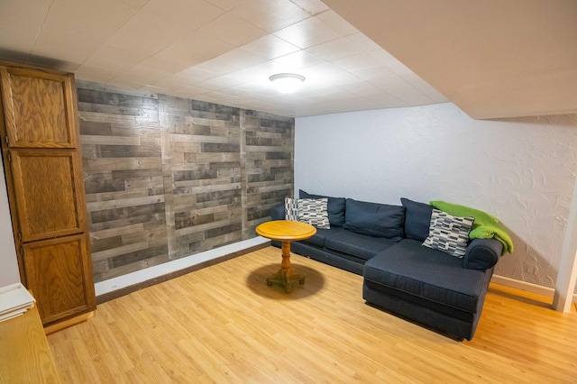 1291 103rd Ave, Plainwell, MI 49080 - living room with light wood-style floors and baseboards