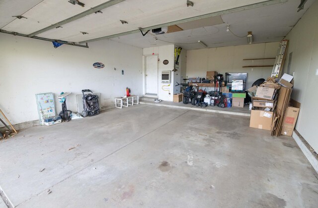 1291 103rd Ave, Plainwell, MI 49080 - garage with a garage door opener